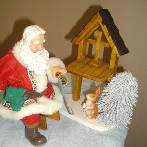 Possible Dreams Clothtique Trailside Prayer Santa figurine.